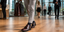 Premium brown leather business casual shoes styled with tailored office outfit in a modern workplace