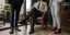 Black, brown and oxblood leather shoes styled with men's navy, grey and black suits